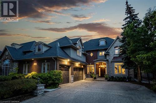 View of front facade featuring a garage - 1143 Riverbank Way, Oakville, ON 