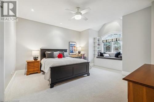 Carpeted bedroom featuring ceiling fan - 1143 Riverbank Way, Oakville, ON 