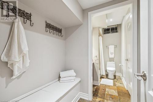 Bathroom with toilet and curtained shower - 1143 Riverbank Way, Oakville, ON 