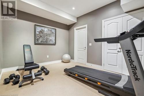 Workout room with carpet flooring - 1143 Riverbank Way, Oakville, ON 