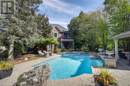 View of swimming pool with a patio - 1143 Riverbank Way, Oakville, ON 