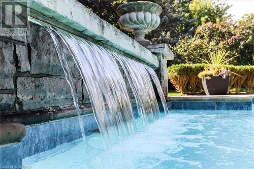 View of pool featuring pool water feature - 1143 Riverbank Way, Oakville, ON 