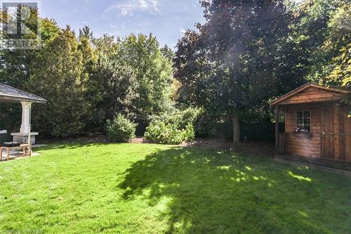 View of yard featuring a shed - 1143 Riverbank Way, Oakville, ON 