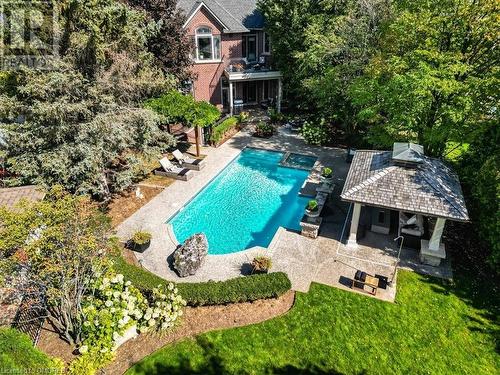 View of swimming pool featuring a gazebo and a patio - 1143 Riverbank Way, Oakville, ON 