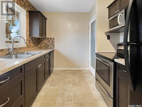 1512 91St Street, North Battleford, SK - Indoor Photo Showing Kitchen With Double Sink