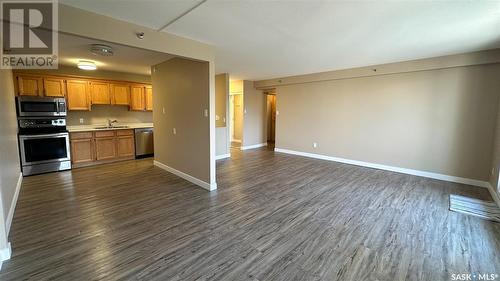 208 4045 Rae Street, Regina, SK - Indoor Photo Showing Kitchen With Double Sink