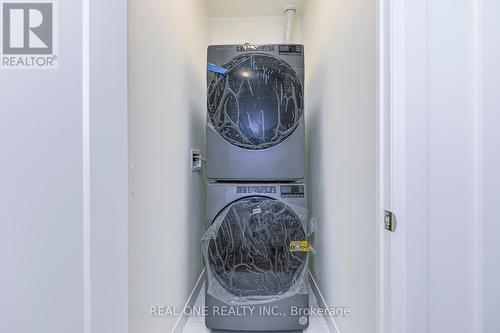 812 - 509 Dundas Street W, Oakville, ON - Indoor Photo Showing Laundry Room