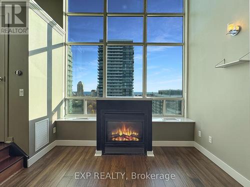 Ph832 - 250 Manitoba Street, Toronto, ON - Indoor Photo Showing Other Room With Fireplace