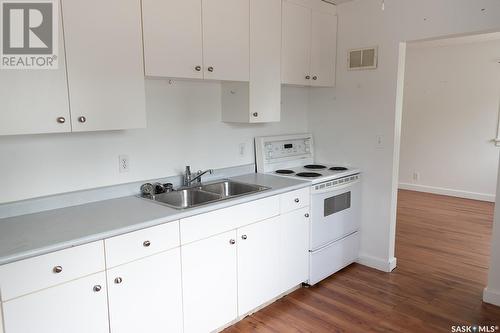 138 G Avenue N, Saskatoon, SK - Indoor Photo Showing Kitchen With Double Sink