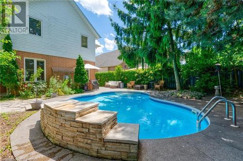 View of pool with a patio - 146 Kitty Murray Lane, Ancaster, ON - Outdoor With In Ground Pool With Backyard