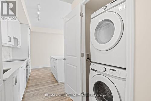 706 - 9075 Jane Street S, Vaughan, ON - Indoor Photo Showing Laundry Room