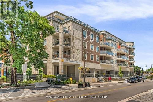 209 - 86 Woodbridge Avenue, Vaughan, ON - Outdoor With Balcony With Facade