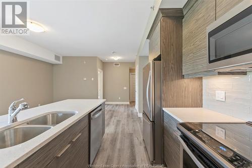 955 Ouellette Avenue Unit# 104, Windsor, ON - Indoor Photo Showing Kitchen With Stainless Steel Kitchen With Double Sink