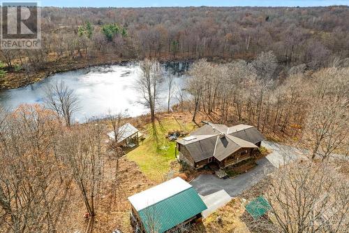 Peacefully private 26 acres with scribed log home, detached garage and lake-pond - 921 Norwood Road, Westport, ON - Outdoor With View