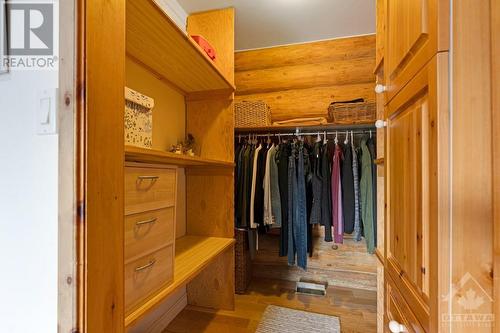 Primary suite walk-in closet - 921 Norwood Road, Westport, ON - Indoor