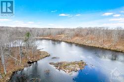 Serene spring-fed lake-pond for kayaking, skating and snowshoeing - 