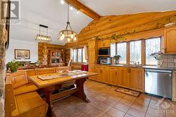 Kitchen with bench-seated breakfast nook - 