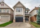 View of front facade featuring a garage - 727 Zermatt Drive, Waterloo, ON  - Outdoor With Facade 