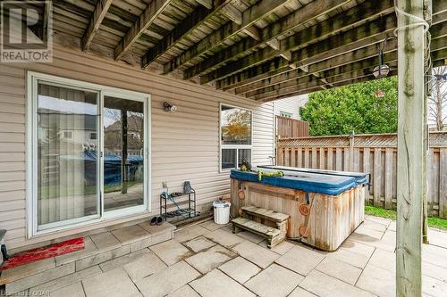 View of patio / terrace with a hot tub - 727 Zermatt Drive, Waterloo, ON - Outdoor With Deck Patio Veranda With Exterior