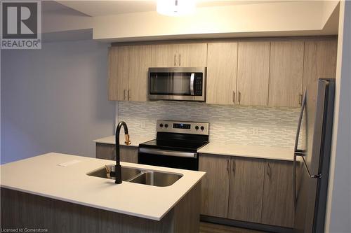 16 Markle Crescent Unit# 102, Ancaster, ON - Indoor Photo Showing Kitchen With Double Sink With Upgraded Kitchen