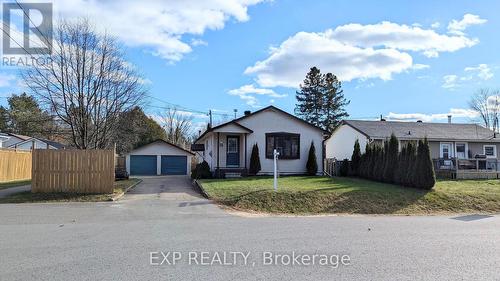 19 Larch Street, Highlands East, ON - Outdoor With Facade