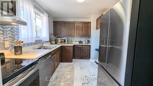 19 Larch Street, Highlands East, ON - Indoor Photo Showing Kitchen With Double Sink