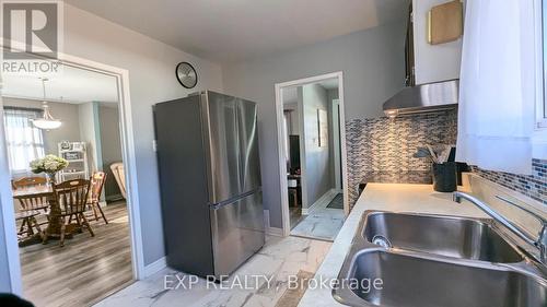 19 Larch Street, Highlands East, ON - Indoor Photo Showing Kitchen With Double Sink