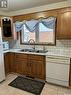 224 Duncan Road, Estevan, SK  - Indoor Photo Showing Kitchen With Double Sink 