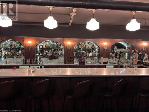 Bar with decorative light fixtures - 33 Queen Street S Unit# 1B, Kitchener, ON 