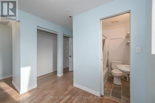 Main floor bedroom with large closets - 22919 Hagerty Road, Newbury, ON - Indoor Photo Showing Bathroom