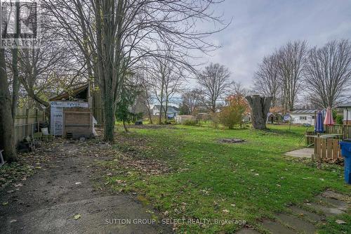 Large entry into backyard, with wide gate access. - 22919 Hagerty Road, Newbury, ON - Outdoor