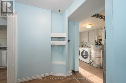 Hall to utility room and right to the kitchen - 22919 Hagerty Road, Newbury, ON - Indoor Photo Showing Laundry Room