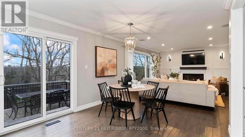 2300 Lime Kiln Drive, London, ON - Indoor Photo Showing Dining Room With Fireplace