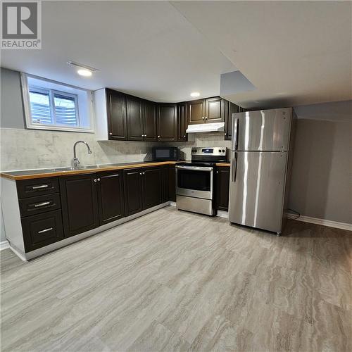 70 Mcintyre Street, Nairn Centre, ON - Indoor Photo Showing Kitchen With Double Sink