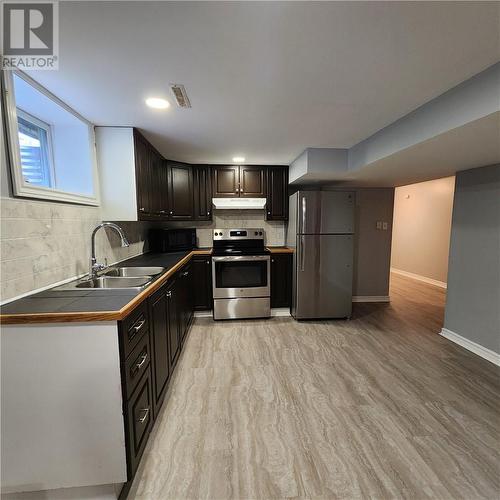 70 Mcintyre Street, Nairn Centre, ON - Indoor Photo Showing Kitchen With Double Sink