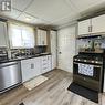 70 Mcintyre Street, Nairn Centre, ON  - Indoor Photo Showing Kitchen With Double Sink 