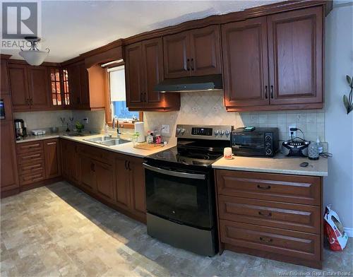 11512 Route 11, Pokemouche, NB - Indoor Photo Showing Kitchen With Double Sink