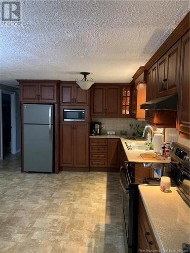 11512 Route 11, Pokemouche, NB - Indoor Photo Showing Kitchen With Double Sink