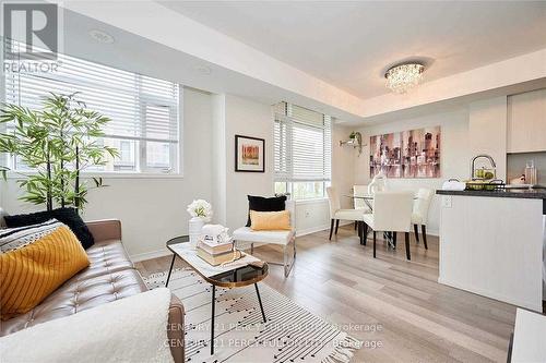 315 - 90 Orchid Place Drive, Toronto, ON - Indoor Photo Showing Living Room