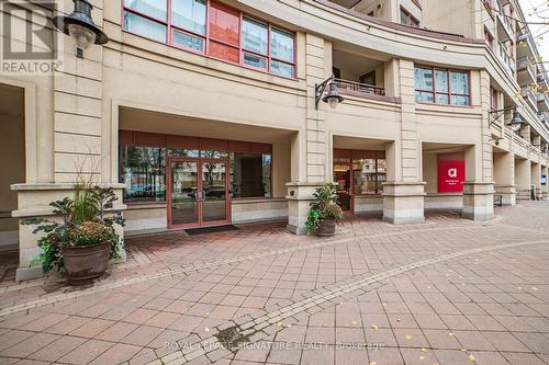 211 - 27 Rean Drive, Toronto, ON - Outdoor With Balcony With Facade