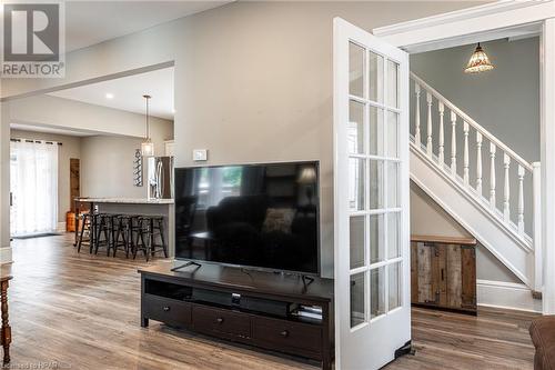 Living room with hardwood / wood-style floors - 175 Mcnab St, Stratford, ON - Indoor Photo Showing Other Room