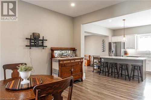 Dining space featuring sink and light wood-type flooring - 175 Mcnab St, Stratford, ON - Indoor Photo Showing Dining Room