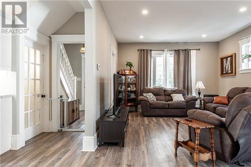 Living room featuring hardwood / wood-style flooring and lofted ceiling - 175 Mcnab St, Stratford, ON - Indoor Photo Showing Living Room