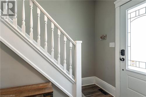 Entryway with dark hardwood / wood-style floors - 175 Mcnab St, Stratford, ON - Indoor Photo Showing Other Room