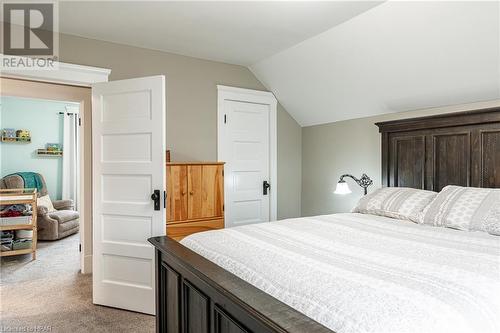 Carpeted bedroom featuring vaulted ceiling - 175 Mcnab St, Stratford, ON - Indoor Photo Showing Bedroom