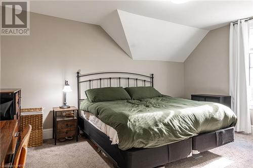 Bedroom with carpet and vaulted ceiling - 175 Mcnab St, Stratford, ON - Indoor Photo Showing Bedroom