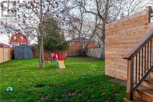 View of yard with a playground and a storage unit - 175 Mcnab St, Stratford, ON - Outdoor