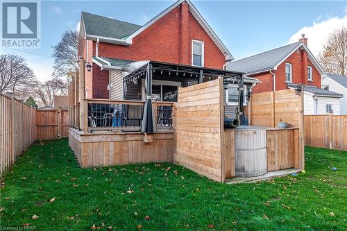 Rear view of property with a yard - 175 Mcnab St, Stratford, ON - Outdoor With Deck Patio Veranda