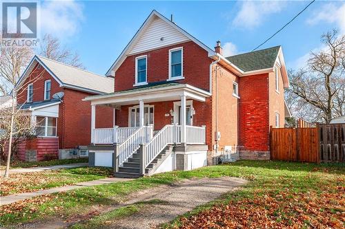 View of front facade with covered porch - 175 Mcnab St, Stratford, ON - Outdoor With Facade