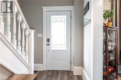 Entrance foyer with dark wood-type flooring - 175 Mcnab St, Stratford, ON - Indoor Photo Showing Other Room